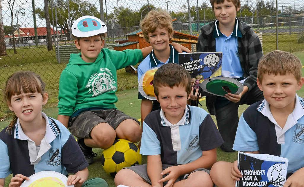 Warwick East students Lyessa Utz, Tyson Smith, Harrison Hagenlocher, (back) Christian Hope, William McKay and Blake Latham kick off Education Week.